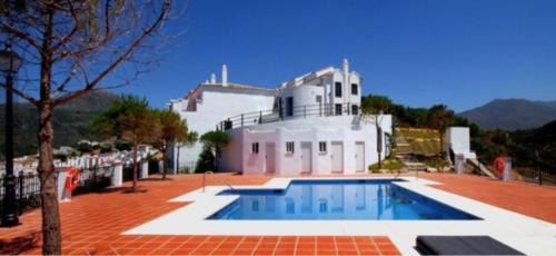 Casares House | Stylish 3 bed house 2 bathrooms, with patio, roof terrace and communal pool 5 minutes away from the beautiful Spanish white village of Casares Pueblo and only 20 mins from the sea
