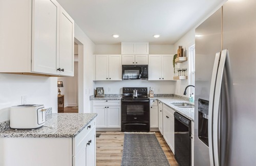 Wilmington House | Stylish 3 BR House: 1 King Bed. Centrally Located!