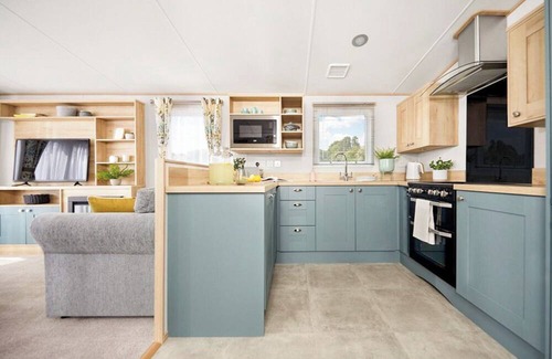 Graigfechan House | Stylish and modern 12ft-wide caravan with one double two one twin.