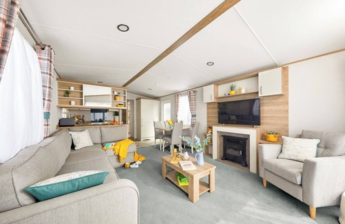 Aberystwyth House | Stylish and modern caravan with one double and two twin.