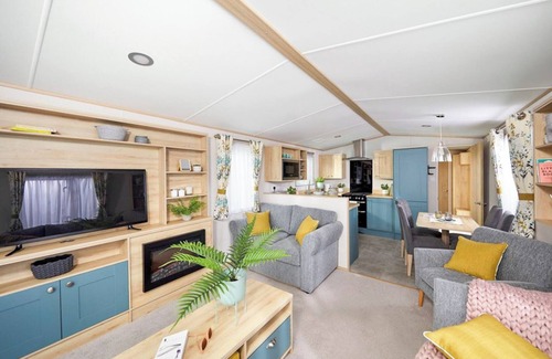 Aberystwyth House | Stylish and modern caravan with one double and two twin.