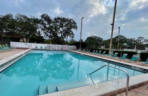 Trailer Estates Apartment | Stylish and Modern Shorewalk condo close to top beaches, heated pools, hot tub, IMG Academy, dining