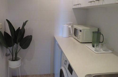 Seaforth Apartment | Stylish apartment with beautiful garden patio