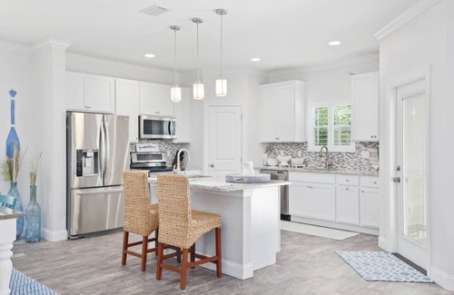 Jacksonville Beach House | Stylish Beach Home with Heated Pool & Relaxing Yard