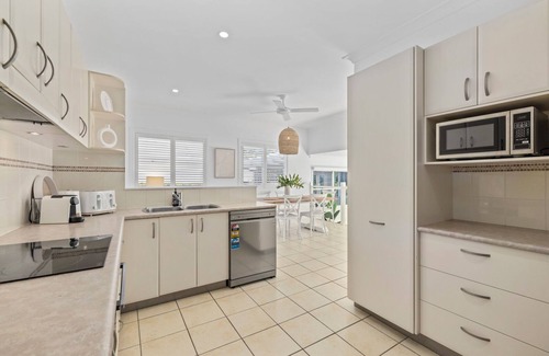Sawtell House | Stylish Beach House with Pool, Close walk to Cafes and Beach, Golf Course View