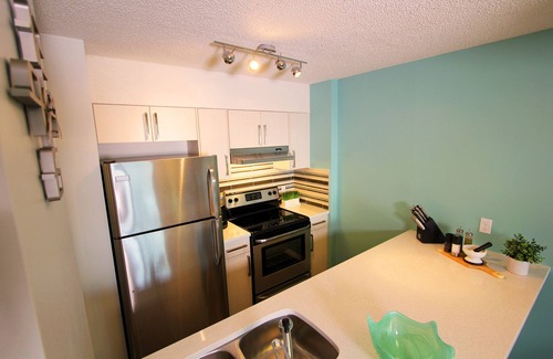 Eau Claire Condo | Stylish Calgary Downtown Executive Suite #BL231315