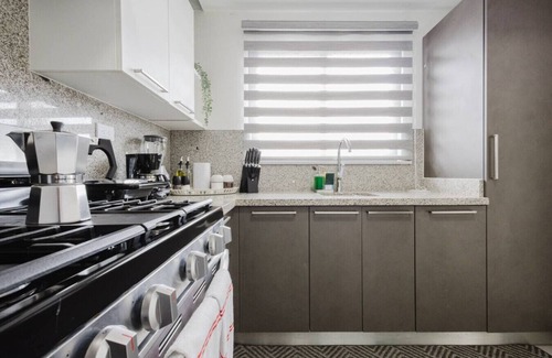 Lope De Vega Condo | Stylish, City Center Condo, Fast Wi-Fi, Full AC.