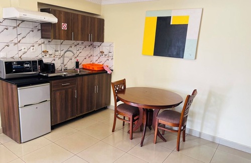 Kigali Apartment | Stylish City Oasis: 5 Location - Pool - City View