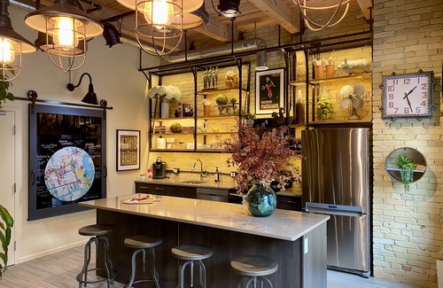 Exchange District Condo | Stylish Designer Loft, Historic Exchange District, Exposed Brick & High Ceilings