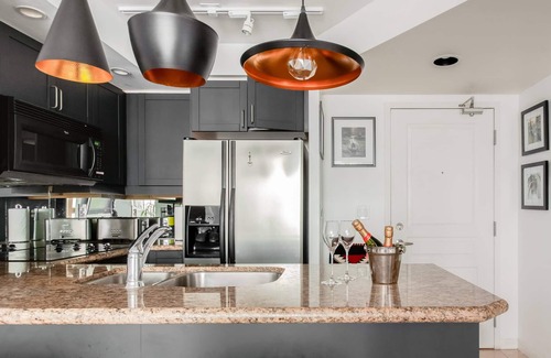 Financial District Apartment | Stylish downtown apartment with private patio and parking