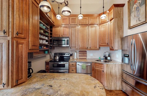 Historic Downtown Durango Apartment | Stylish, downtown condo w/loft, kitchen, & fireplace plus shared patio & grill