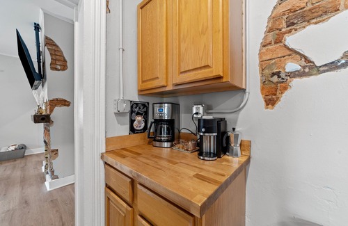Graham House | Stylish downtown home: private hot tub, outdoor pizza oven & bumper pool table