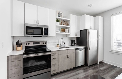 Cole-Noble District Apartment | Stylish Downtown Studio by CozySuites