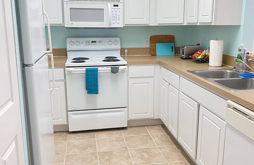 Haile Plantation Condo | Stylish ground floor 2 bedroom/2 bath condo. Dog Friendly!