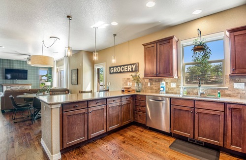 Flying Horse House | Stylish home with private hot tub & game room - dog-friendly