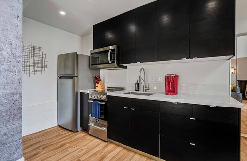 Little Italy Apartment | Stylish Little Italy Loft: Modern Urban Retreat