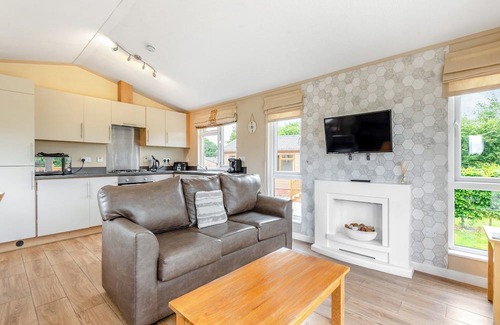 Halfway House Ski Chalet | Stylish luxury lodge with hill view.