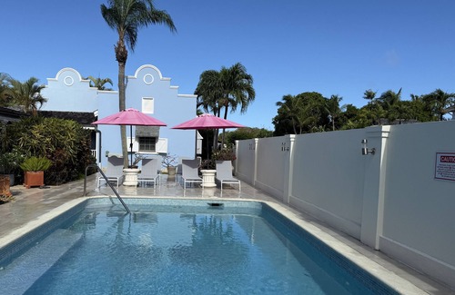 Porters Villa | Stylish luxury traditional-style poolside villa nr. beach. Two ensuite bedrooms.