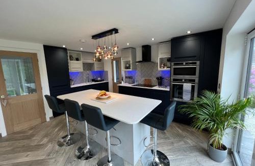 Holyhead House | Stylish Modern Home with Parking Enclosed Garden