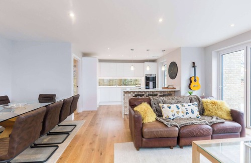 Chichester House | Stylish new home with parking - king beds, garden