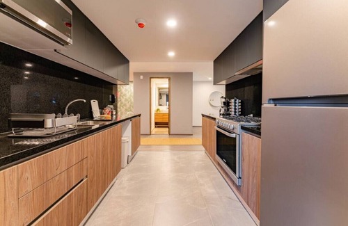 La Condesa Condo | Stylish Parque España,Condesa 2BR w/Rooftop & Gym