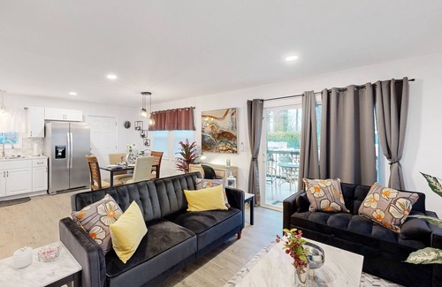 Charlotte House | Stylish & private guesthouse with sunny patio, central AC, & W/D - with pool
