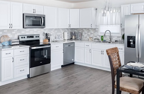 Charlotte House | Stylish & private guesthouse with sunny patio, central AC, & W/D - with pool