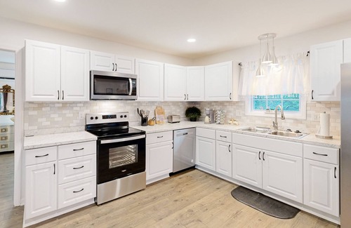 Charlotte House | Stylish & private guesthouse with sunny patio, central AC, & W/D - with pool