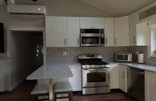 Little Falls House | Stylish Suburban Retreat – Peaceful, Private, and Close to It All