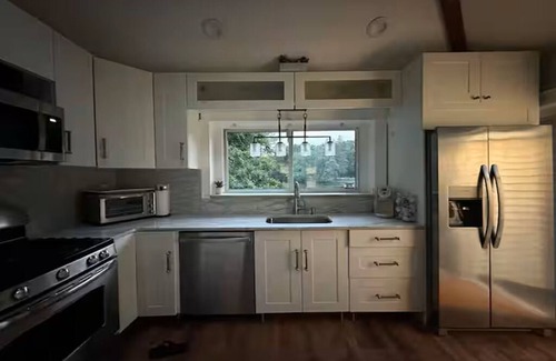 Little Falls House | Stylish Suburban Retreat – Peaceful, Private, and Close to It All