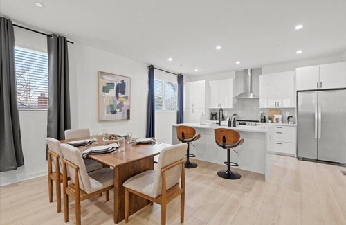 Charlotte House | Stylish Stay with Rooftop Views and Garage Access