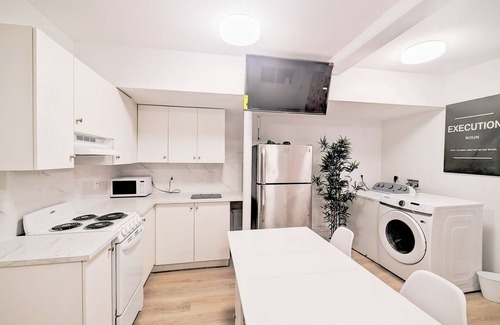 Queens Apartment | Stylish Studio Apartment on Main Street with Courtyard and Free Parking!