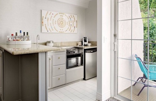 Tri-West Apartment | Stylish Suite w/Balcony, Gym, Pool, Sauna & Pet-Friendly Access!