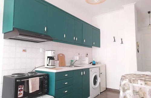 Corfu Town Apartment | Stylish tennis view apt 3 min to town/sea