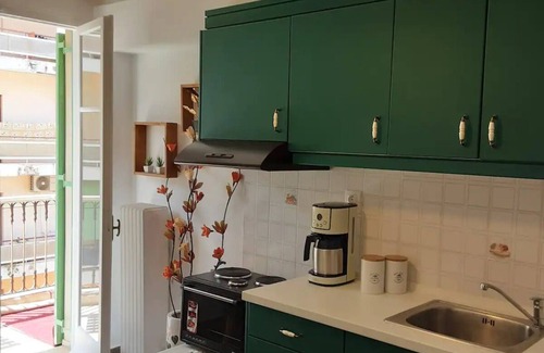 Corfu Town Apartment | Stylish tennis view apt 3 min to town/sea