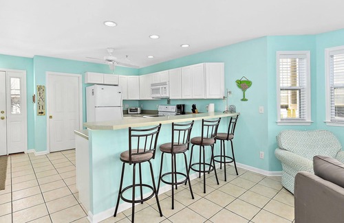 Midtown Ocean City House | Stylish, upscale 3 bedroom condo with a television in every bedroom and living room, free WiFi, and two floors located downtown only a few streets from the boardwalk and only steps to the beach!