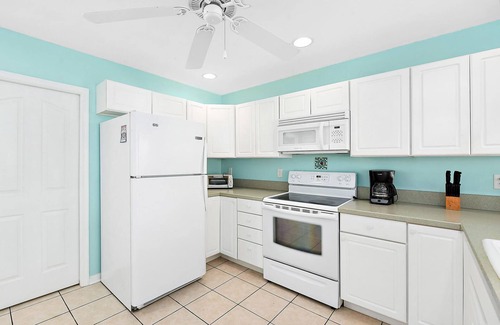 Midtown Ocean City House | Stylish, upscale 3 bedroom condo with a television in every bedroom and living room, free WiFi, and two floors located downtown only a few streets from the boardwalk and only steps to the beach!