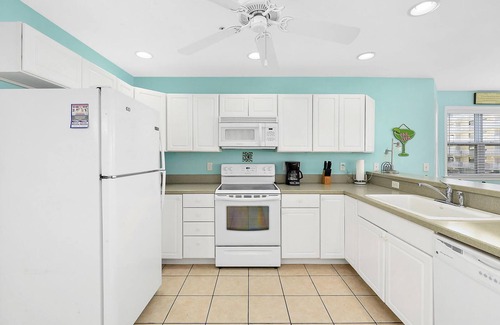 Midtown Ocean City House | Stylish, upscale 3 bedroom condo with a television in every bedroom and living room, free WiFi, and two floors located downtown only a few streets from the boardwalk and only steps to the beach!