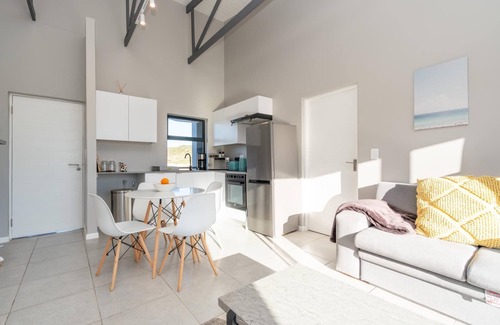 Mykonos Apartment | Stylish Urban Stay | Balcony | Braai Area