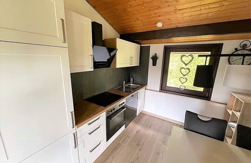 Feriendorf Hennesee House | Stylish vacation home with covered terrace.