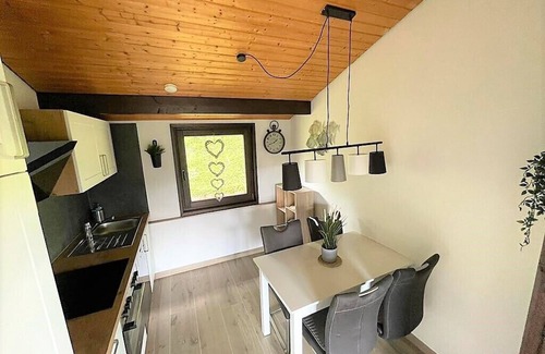 Feriendorf Hennesee House | Stylish vacation home with covered terrace.
