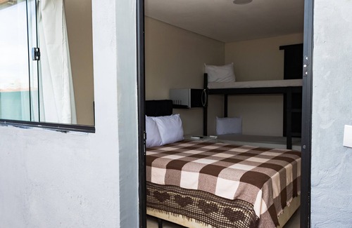 Jardim Aruan Bed & Breakfast | Suíte Familiar Praia Indaiá - 03 Caraguatatuba