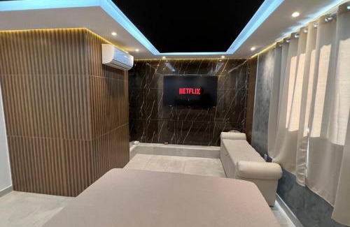 Centro Apartment | Suíte Gold Cinema 303