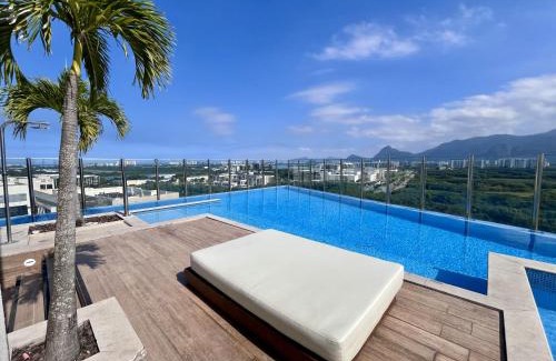 Jacarepagua House | Suíte com varanda e piscina na Barra da Tijuca - RJ