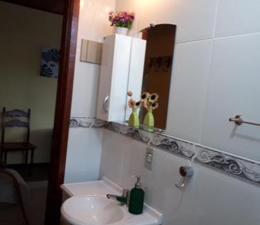 Teresopolis Apartment | Suíte com vista da Serra