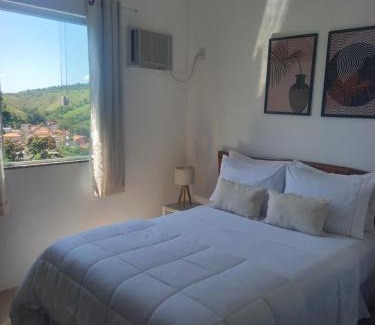 Conservatoria House | Suíte confortável com ar condicionado 101