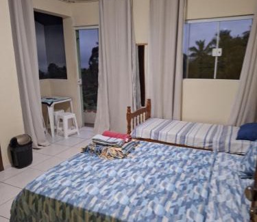 Veloso House | Suíte Ninho do Sabiá
