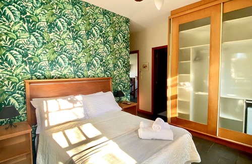 Campeche Norte House | Suíte Praia da Armação - Pousada Tulipane -Floripa