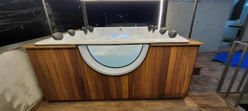 Praia das Palmeiras House | Suíte Praia na casa da Berenice