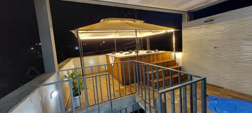 Praia das Palmeiras House | Suíte Praia na casa da Berenice